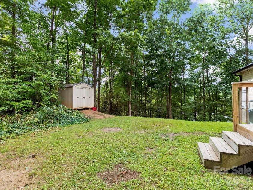 41 Bear Trail, Fairview, NC 28730.  MLS# CAR4420605, YatesRealty ID 48293. Level area perfect for play or entertaining.