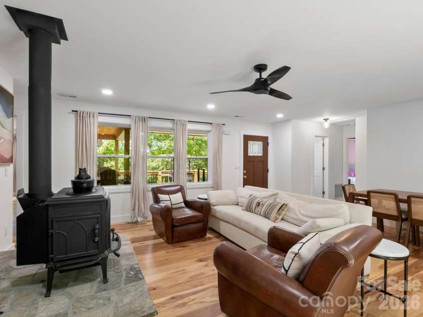 41 Bear Trail, Fairview, NC 28730.  MLS# CAR4420605, YatesRealty ID 48293. Light-filled living room.