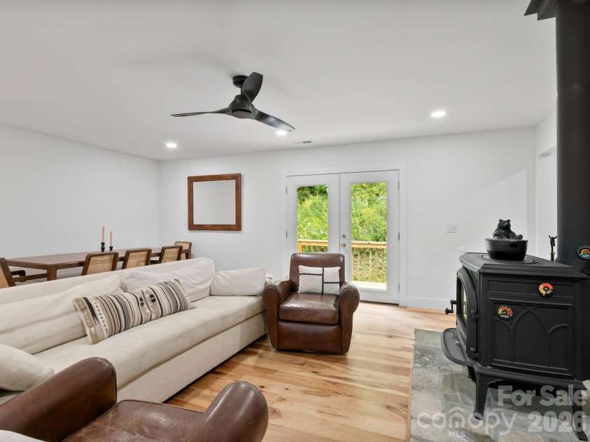 41 Bear Trail, Fairview, NC 28730.  MLS# CAR4420605, YatesRealty ID 48293. Living area connects to back deck, accessible by ramp.