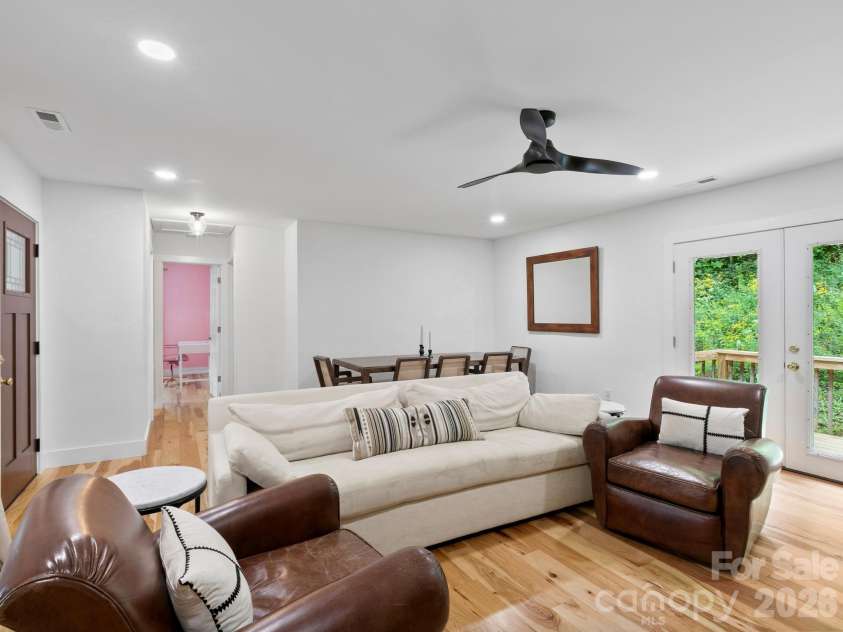41 Bear Trail, Fairview, NC 28730.  MLS# CAR4420605, YatesRealty ID 48293. Living room / dining area.