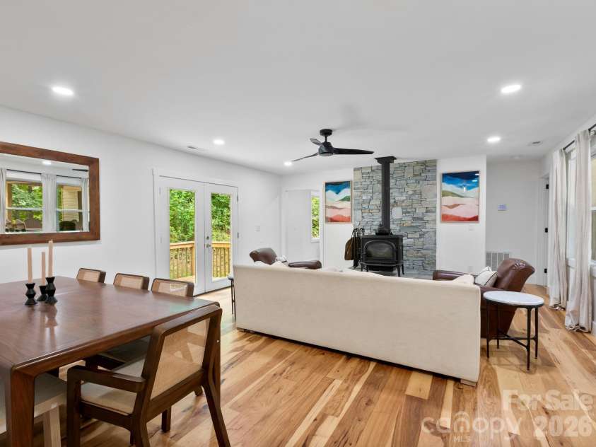 41 Bear Trail, Fairview, NC 28730.  MLS# CAR4420605, YatesRealty ID 48293. Spacious yet intimate living area joins with dining area.
