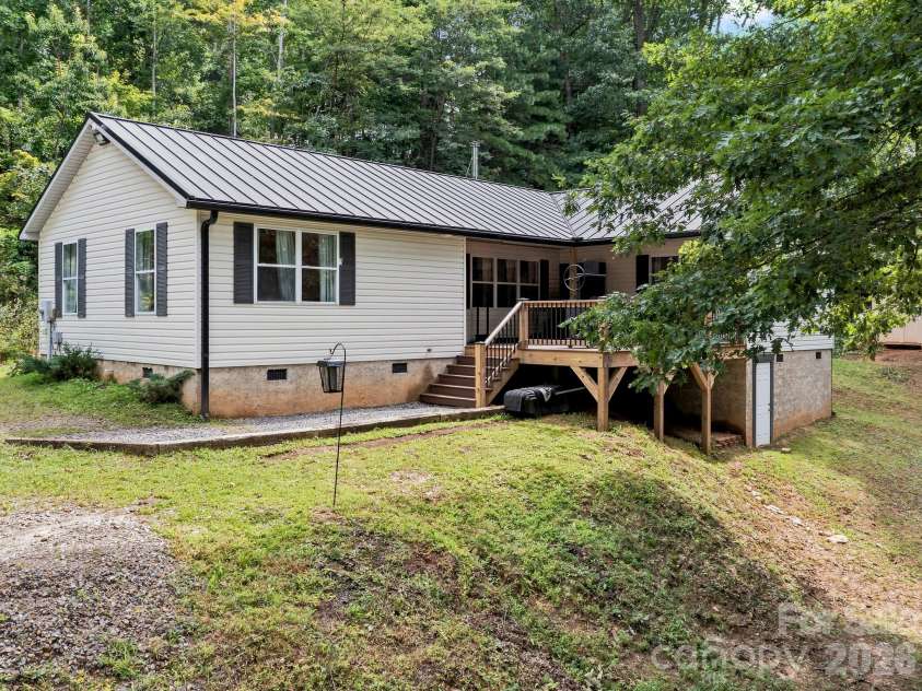 41 Bear Trail, Fairview, NC 28730.  MLS# CAR4420605, YatesRealty ID 48293. Upgraded Trex deck installed in late 2024 / early 2025.