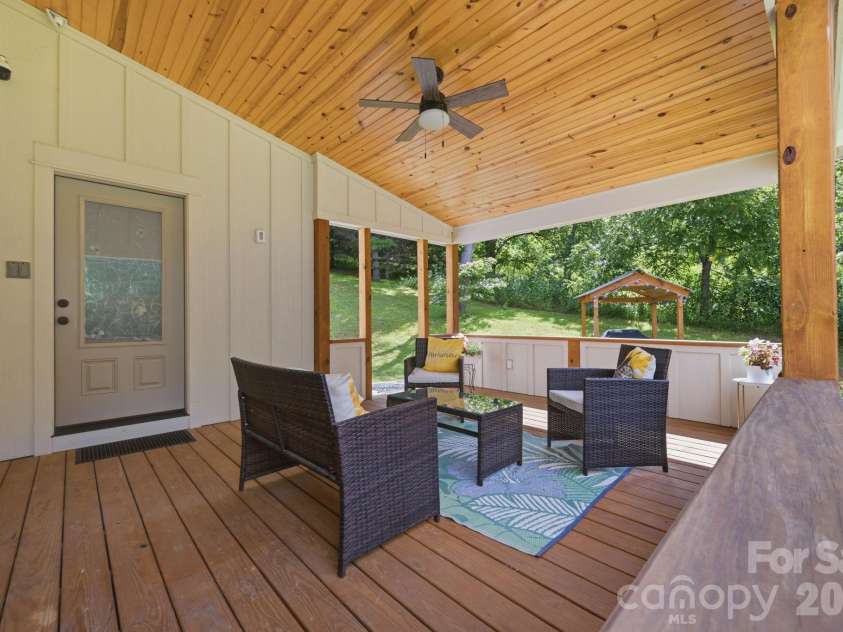 163 Walnut Drive, Jefferson, NC 28640.  MLS# CAR4420717, YatesRealty ID 48294. Covered Back Porch