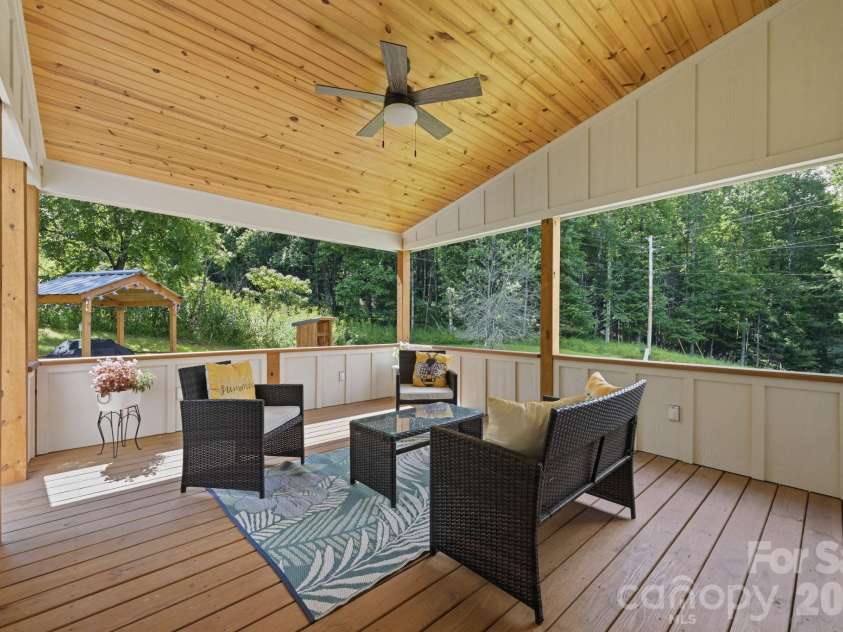 163 Walnut Drive, Jefferson, NC 28640.  MLS# CAR4420717, YatesRealty ID 48294. Covered Back Porch