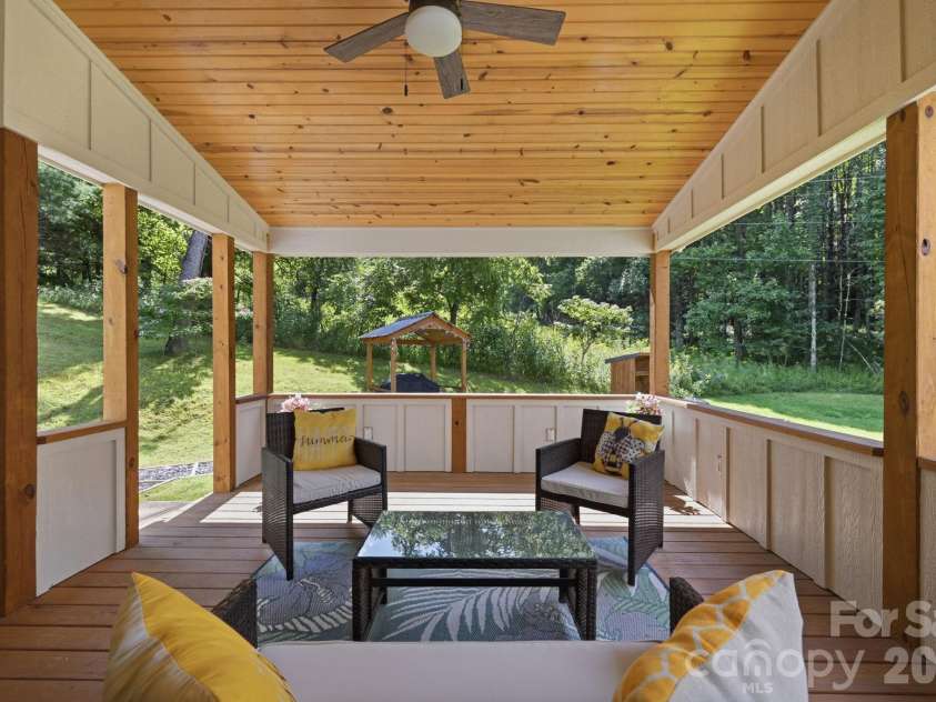163 Walnut Drive, Jefferson, NC 28640.  MLS# CAR4420717, YatesRealty ID 48294. Covered Back Porch