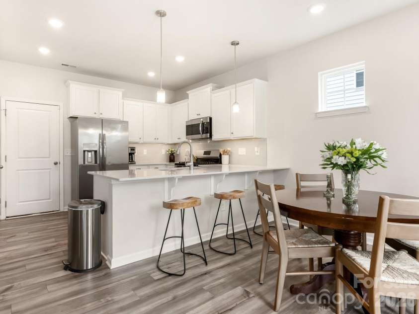 16011 Seagard Cove, Charlotte, NC 28278.  MLS# CAR4351200, YatesRealty ID 4830. Kitchen and Dining Room