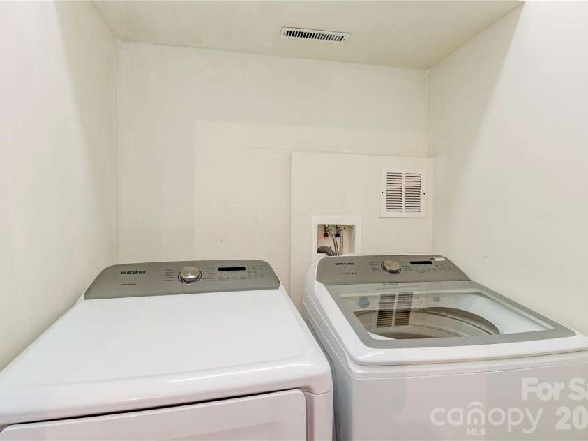 6 Majestic Trace, Hendersonville, NC 28739.  MLS# CAR4150240, YatesRealty ID 48300. The laundry closet accommodates side-by-side or stackable units.
