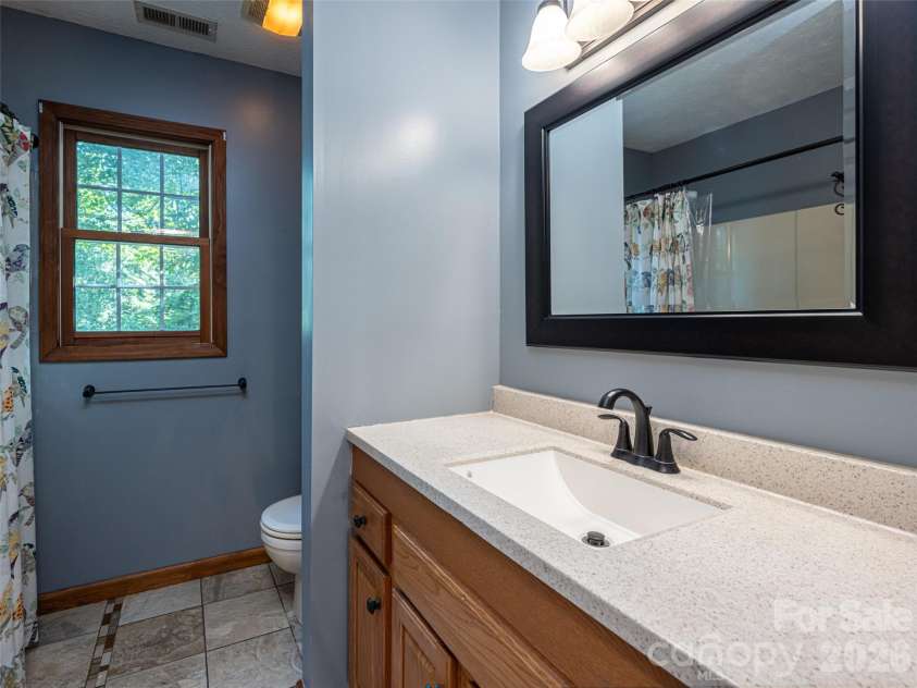 12 Howling Waite Ridge, Candler, NC 28715.  MLS# CAR4420405, YatesRealty ID 48304. 