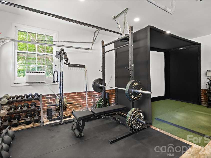 1838 Wendover Road, Charlotte, NC 28211.  MLS# CAR4420286, YatesRealty ID 48313. Work out area (located in garage)