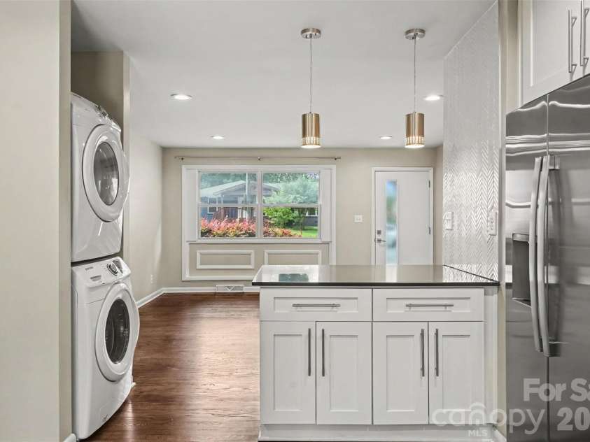 1741 Herrin Avenue, Charlotte, NC 28205.  MLS# CAR4420142, YatesRealty ID 48319. Kitchen looking into living room
