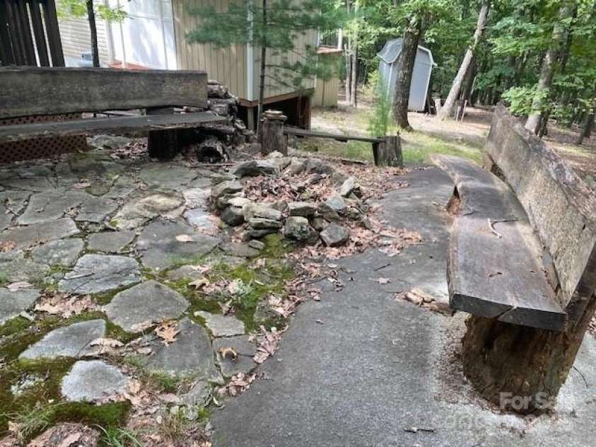 582 Dogwood Circle, Traphill, NC 28685.  MLS# CAR4238397, YatesRealty ID 4832. Firepit