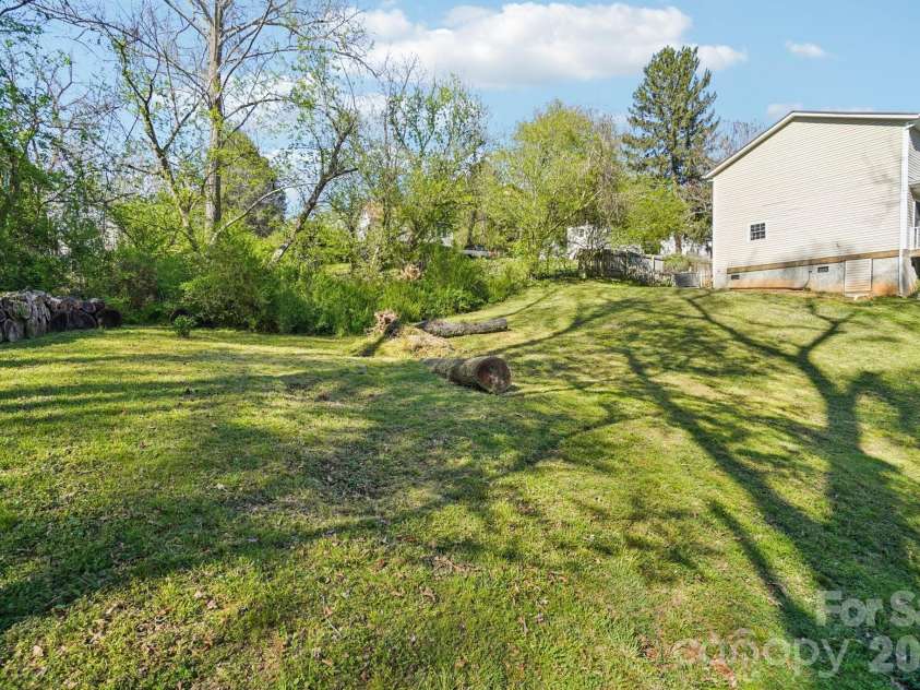153 Hudson Street, Asheville, NC 28806.  MLS# CAR4420786, YatesRealty ID 48322. Backyard