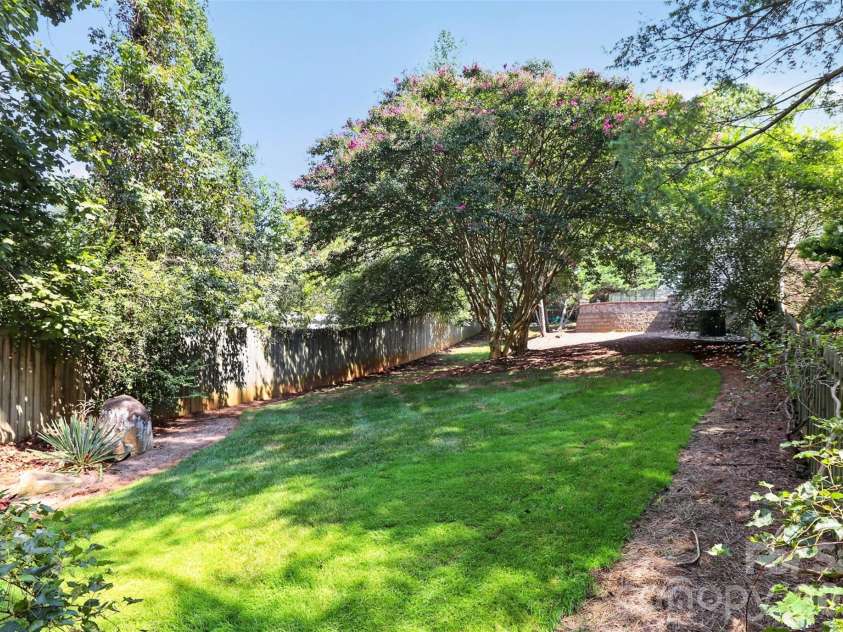 176 Toucan Road, Mooresville, NC 28117.  MLS# CAR4420757, YatesRealty ID 48328. Side/front yard