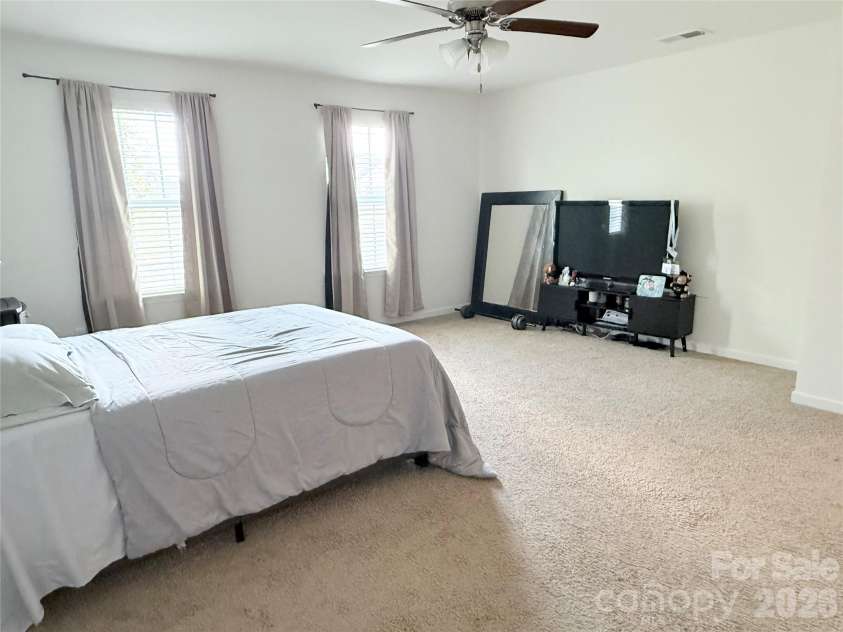 107 Longleaf Drive, Mooresville, NC 28117.  MLS# CAR4420339, YatesRealty ID 48336. Primary bedroom
