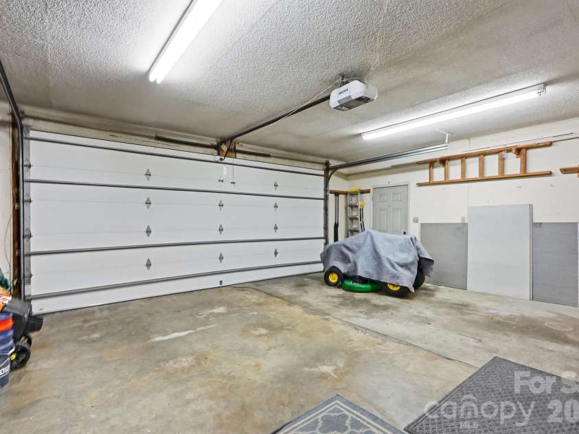 1471 Ontario Drive, Kannapolis, NC 28083.  MLS# CAR4420487, YatesRealty ID 48342. Attached two-car garage with additional storage space