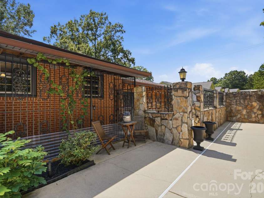 1471 Ontario Drive, Kannapolis, NC 28083.  MLS# CAR4420487, YatesRealty ID 48342. Private backyard pool makes home feel like a getaway