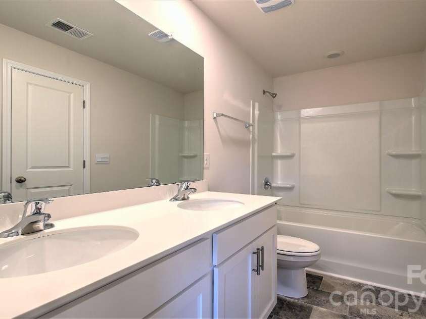 64 Piney Woods Road, Fletcher, NC 28732.  MLS# CAR4420911, YatesRealty ID 48346. Photos are representative