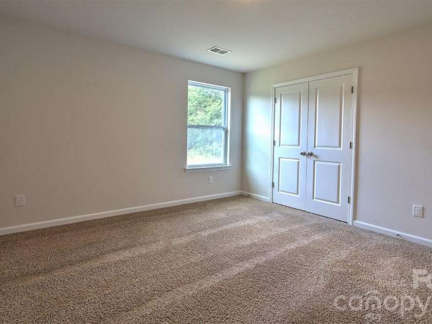 64 Piney Woods Road, Fletcher, NC 28732.  MLS# CAR4420911, YatesRealty ID 48346. Photos are representative