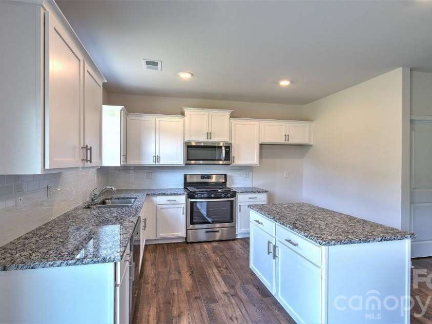 64 Piney Woods Road, Fletcher, NC 28732.  MLS# CAR4420911, YatesRealty ID 48346. Photos are representative