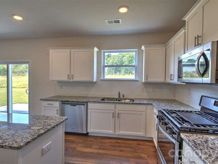 64 Piney Woods Road, Fletcher, NC 28732.  MLS# CAR4420911, YatesRealty ID 48346. Photos are representative