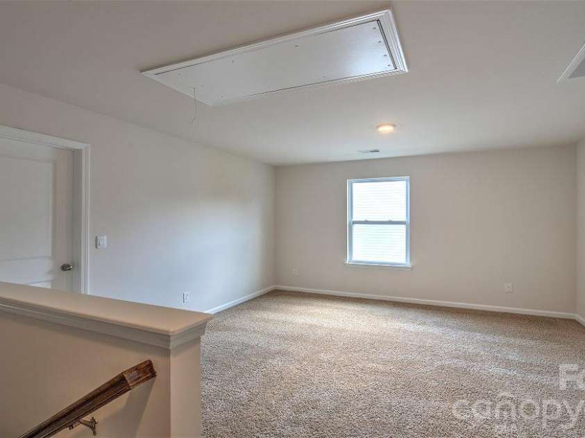 64 Piney Woods Road, Fletcher, NC 28732.  MLS# CAR4420911, YatesRealty ID 48346. Photos are representative