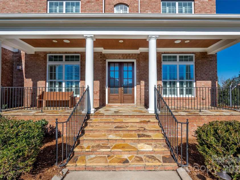 9610 Pensive Lane, Waxhaw, NC 28173.  MLS# CAR4240111, YatesRealty ID 4838. Beautiful covered porch