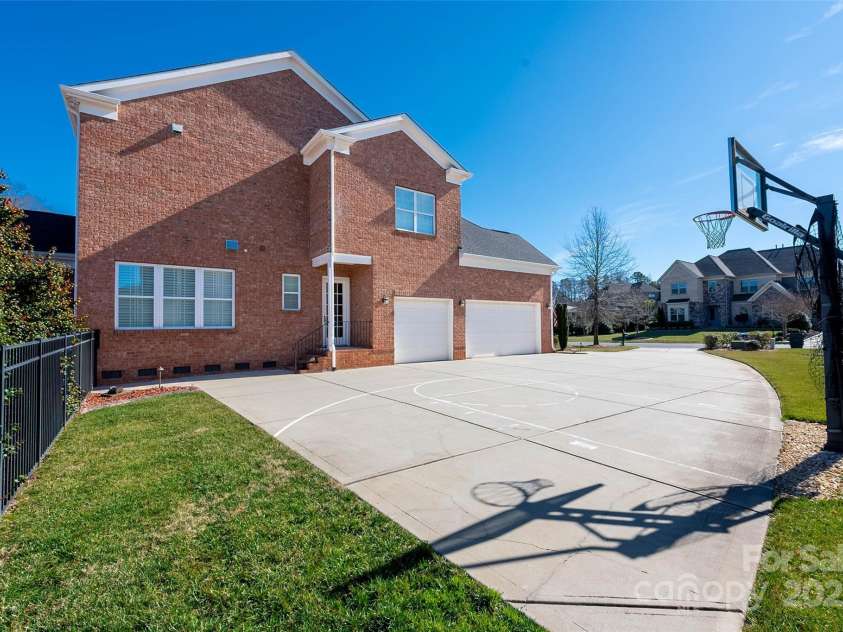 9610 Pensive Lane, Waxhaw, NC 28173.  MLS# CAR4240111, YatesRealty ID 4838. Built in basketball hoop with 3-Point and Free-throw lines