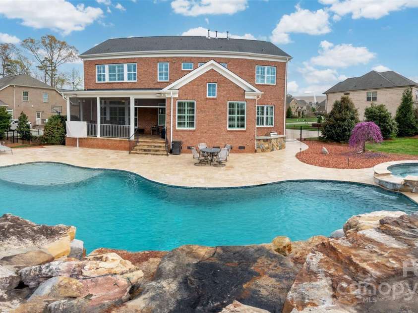 9610 Pensive Lane, Waxhaw, NC 28173.  MLS# CAR4240111, YatesRealty ID 4838. Relaxing salt water pool