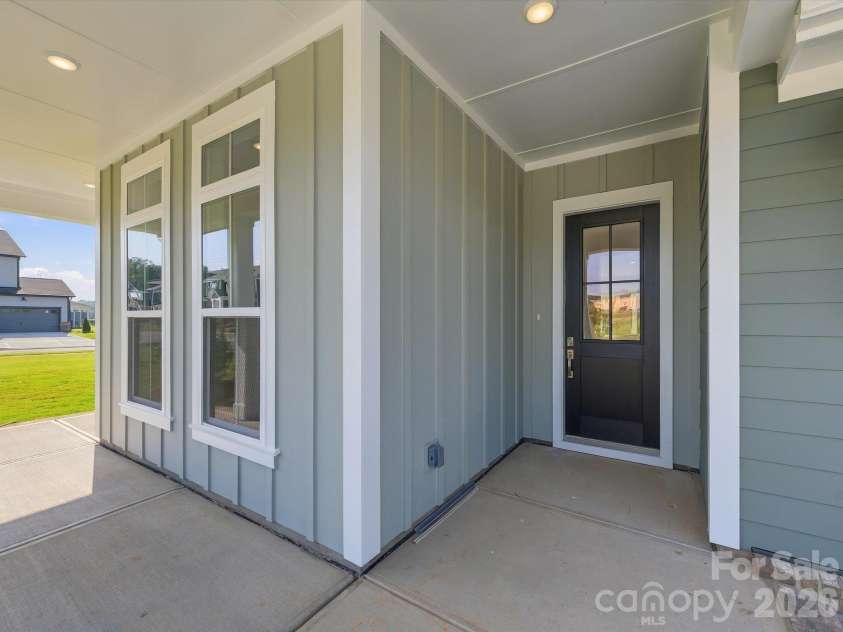 558 Cape Cod Way, Rock Hill, SC 29732.  MLS# CAR4421025, YatesRealty ID 48385. Covered wrap around patio + Hardie Siding