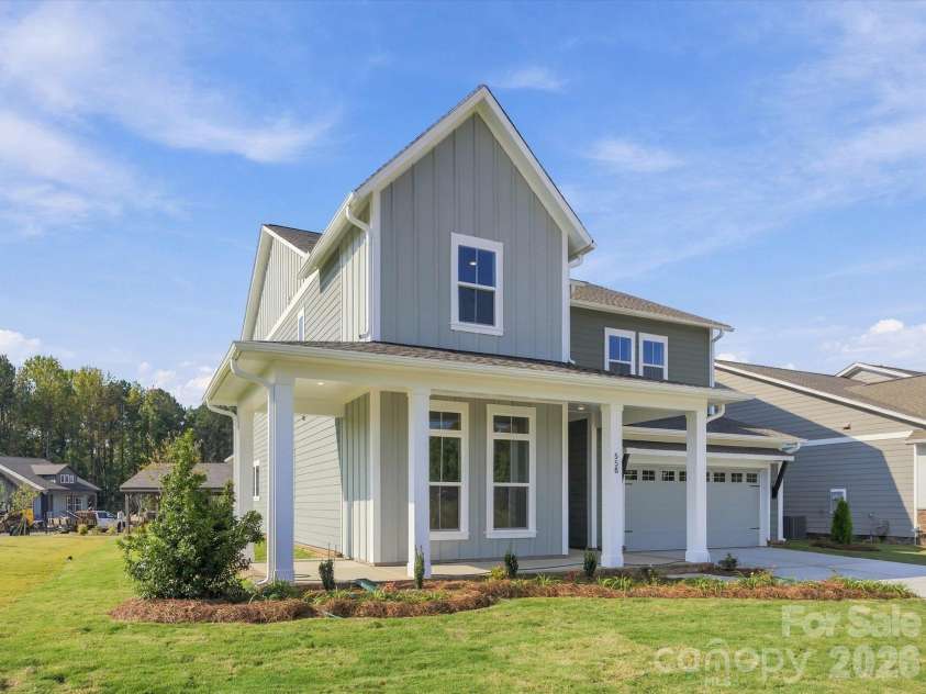 558 Cape Cod Way, Rock Hill, SC 29732.  MLS# CAR4421025, YatesRealty ID 48385. Wrap Around Porch on a corner homesite next to community green space!