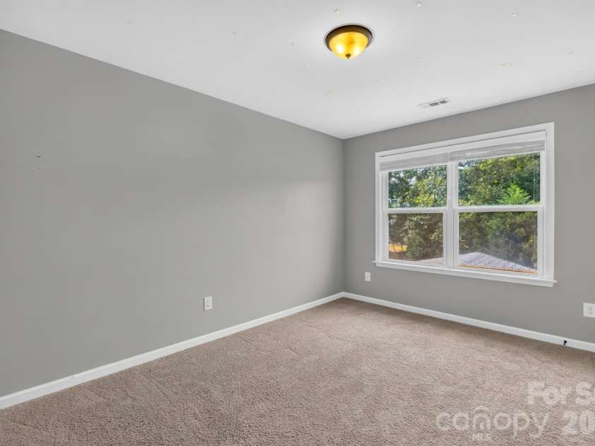 1004 Hawker Road, Matthews, NC 28104.  MLS# CAR4411741, YatesRealty ID 48396. Bedroom 2