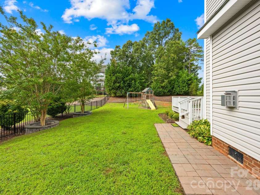 1004 Hawker Road, Matthews, NC 28104.  MLS# CAR4411741, YatesRealty ID 48396. Left side of house