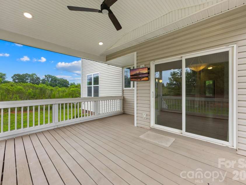 1004 Hawker Road, Matthews, NC 28104.  MLS# CAR4411741, YatesRealty ID 48396. Screen porch