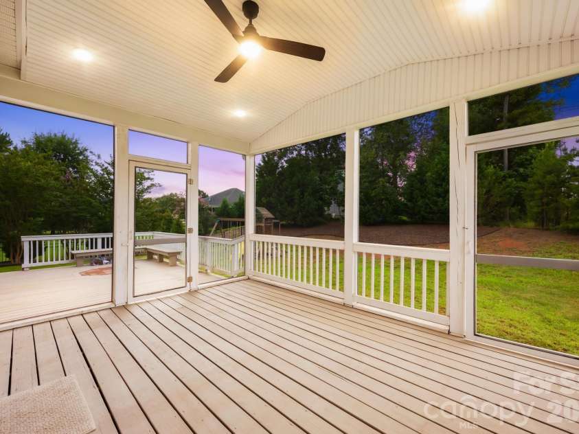 1004 Hawker Road, Matthews, NC 28104.  MLS# CAR4411741, YatesRealty ID 48396. Screen porch - time to Relax