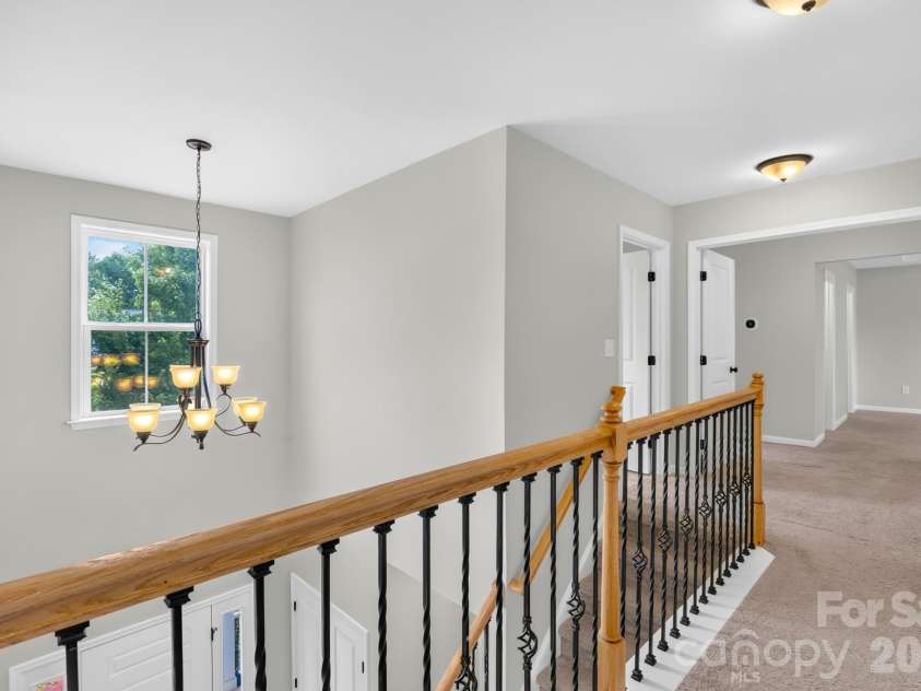1004 Hawker Road, Matthews, NC 28104.  MLS# CAR4411741, YatesRealty ID 48396. Upstairs hallway
