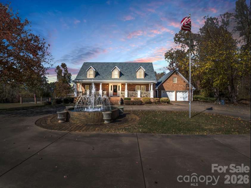 1102 Mountain Road, Bostic, NC 28018.  MLS# CAR4318780, YatesRealty ID 484. Front view with fountain