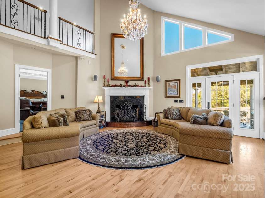 1102 Mountain Road, Bostic, NC 28018.  MLS# CAR4318780, YatesRealty ID 484. Gas log fireplace & doors leading to back porch & patio