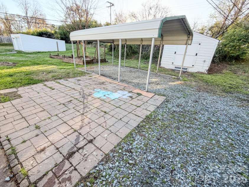 5216 Eaton Circle, Charlotte, NC 28208.  MLS# CAR4356733, YatesRealty ID 4840. Carport