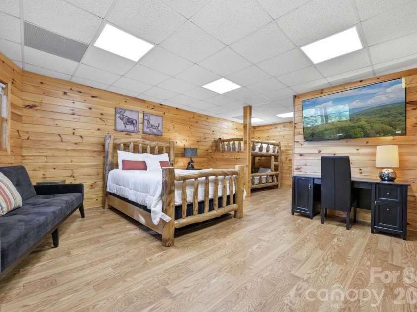 142 Fawn Lane, Purlear, NC 28665.  MLS# CAR4420826, YatesRealty ID 48401. Lower Level Bunk Room/Bonus Room