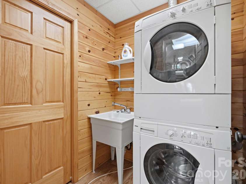 142 Fawn Lane, Purlear, NC 28665.  MLS# CAR4420826, YatesRealty ID 48401. Lower Level Laundry Room with Storage Closet