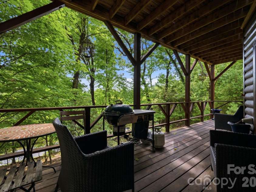 142 Fawn Lane, Purlear, NC 28665.  MLS# CAR4420826, YatesRealty ID 48401. Lower Level Porch