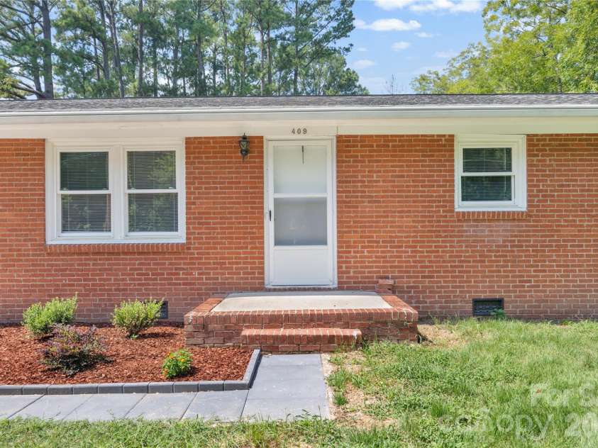 409 Moss Springs Road, Albemarle, NC 28001.  MLS# CAR4420748, YatesRealty ID 48402. 