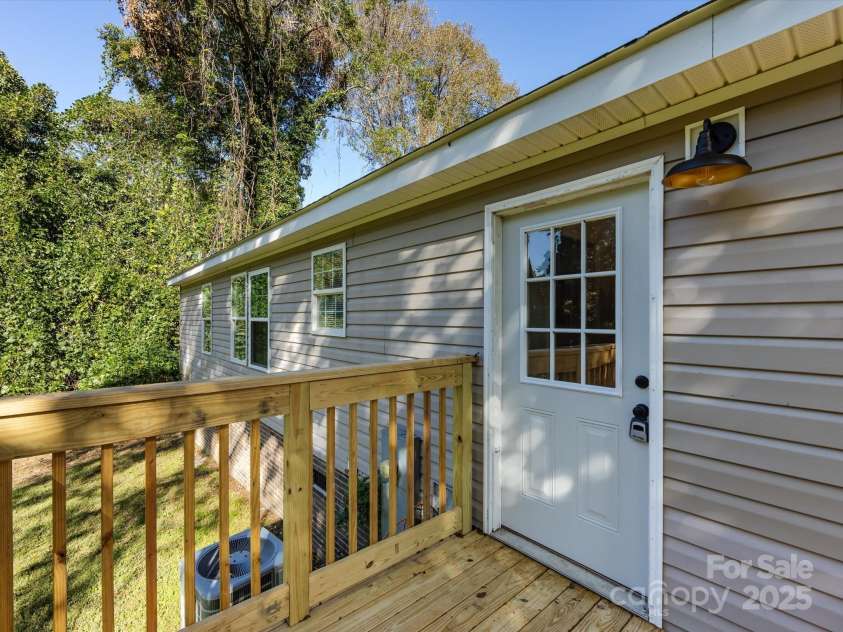 907 4th Avenue, Gastonia, NC 28054.  MLS# CAR4306590, YatesRealty ID 4842. Rear back door entrance