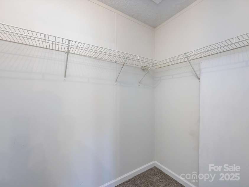 907 4th Avenue, Gastonia, NC 28054.  MLS# CAR4306590, YatesRealty ID 4842. View of primary large walk in closet with insane space!