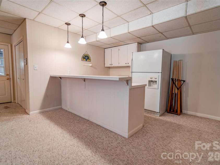 1235 Brookwood Road, Shelby, NC 28150.  MLS# CAR4421045, YatesRealty ID 48425. Basement Kitchen