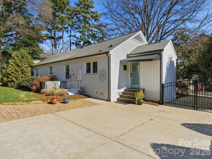 4320 Waterbury Drive, Charlotte, NC 28209.  MLS# CAR4343059, YatesRealty ID 4843. Back of house / Back door exits from laundry area
