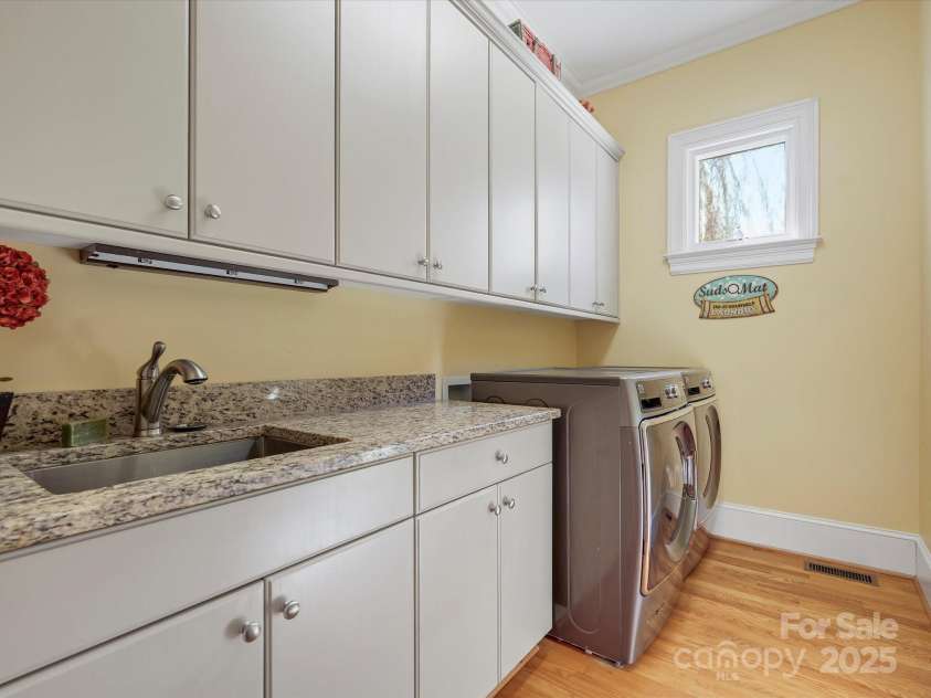 8416 Highgrove Street, Charlotte, NC 28277.  MLS# CAR4232158, YatesRealty ID 4843. Laundry room w sink