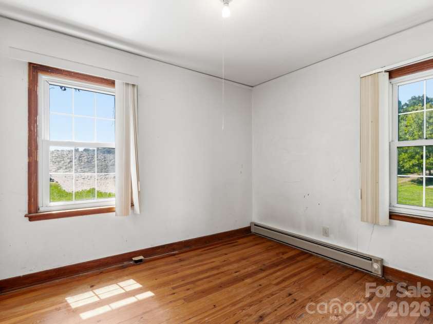 1279 Charlotte Highway, Fairview, NC 28730.  MLS# CAR4421024, YatesRealty ID 48430. Back bedroom