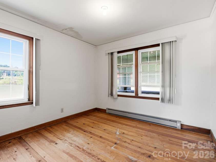 1279 Charlotte Highway, Fairview, NC 28730.  MLS# CAR4421024, YatesRealty ID 48430. Front bedroom
