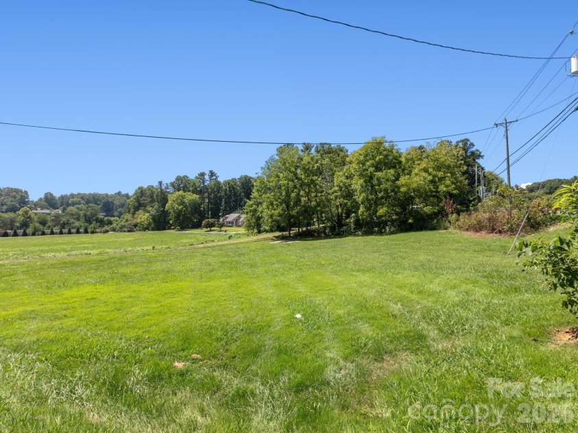 1279 Charlotte Highway, Fairview, NC 28730.  MLS# CAR4421024, YatesRealty ID 48430. Huge Side yard